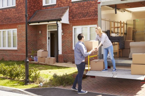Removal van service staff reviewing a customer complaint form