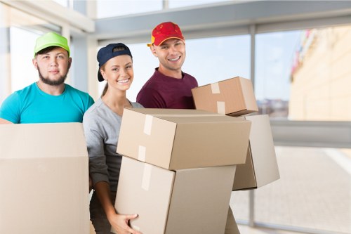 Moving boxes and packing supplies prepared for a home move in Stjohnswood