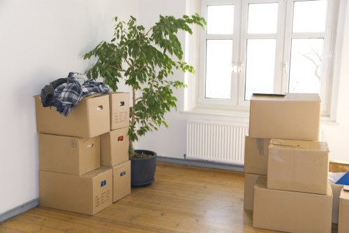 Apartment moving team handling furniture with care