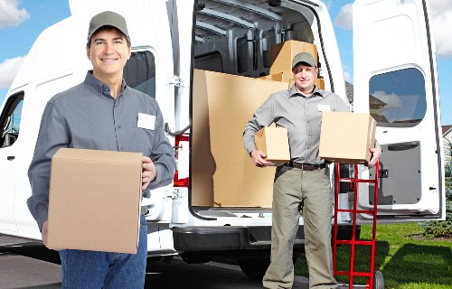 Packed office equipment and documents ready for relocation